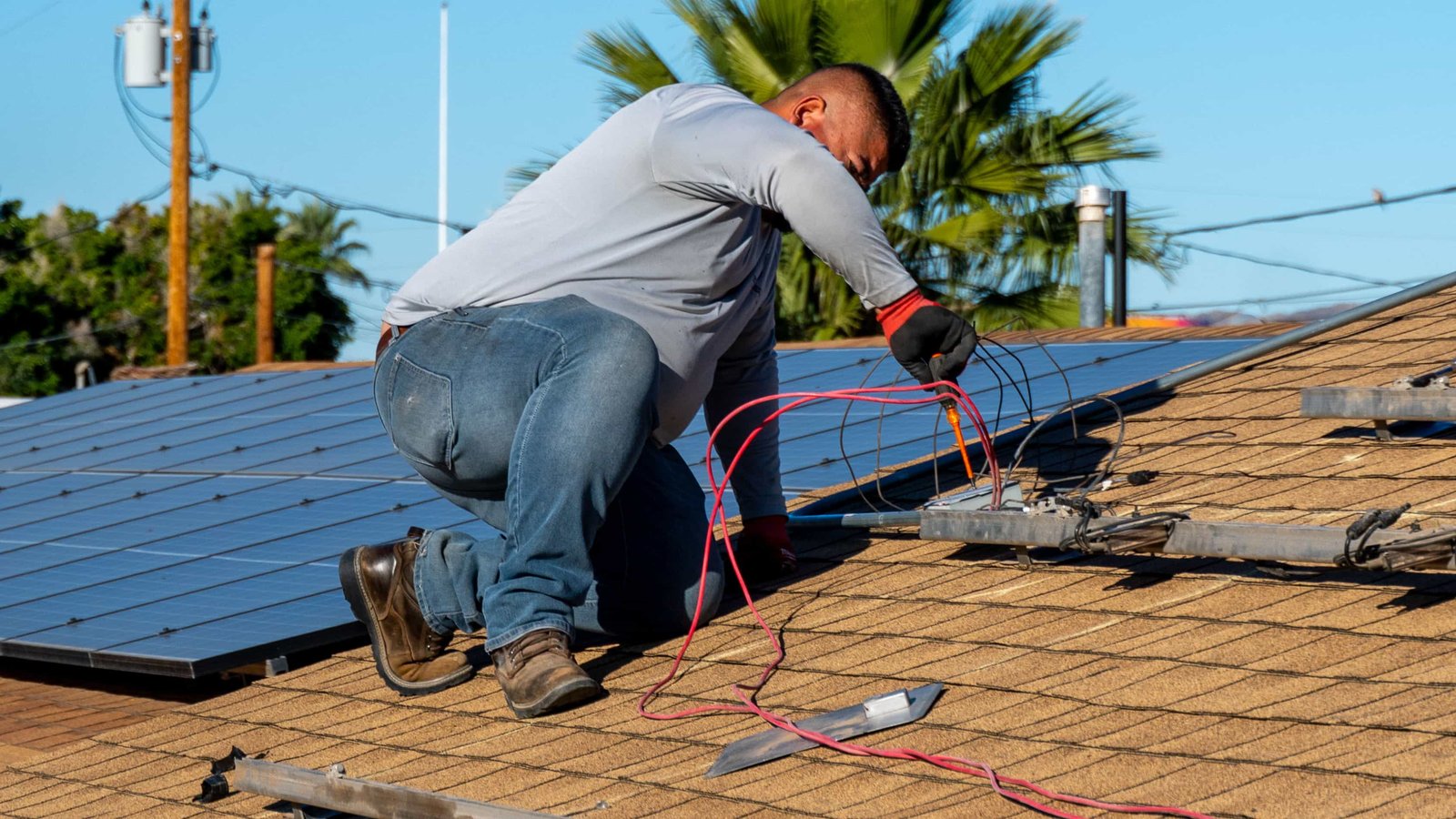 EcoEnergy installer connecting solar wiring